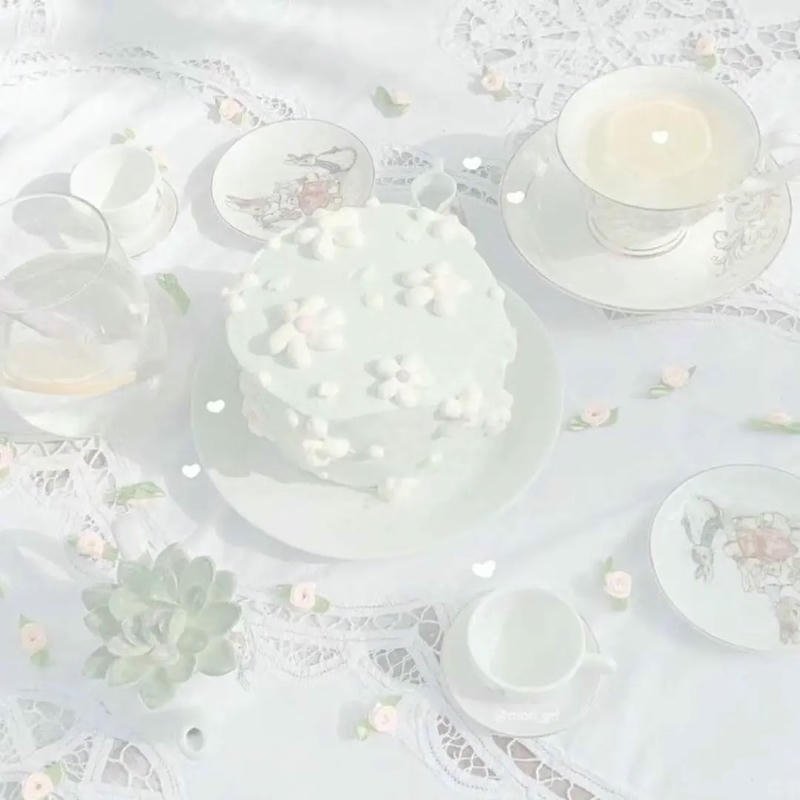 Ảnh bàn tiệc trà bánh ngọt tông màu trắng thanh lịch