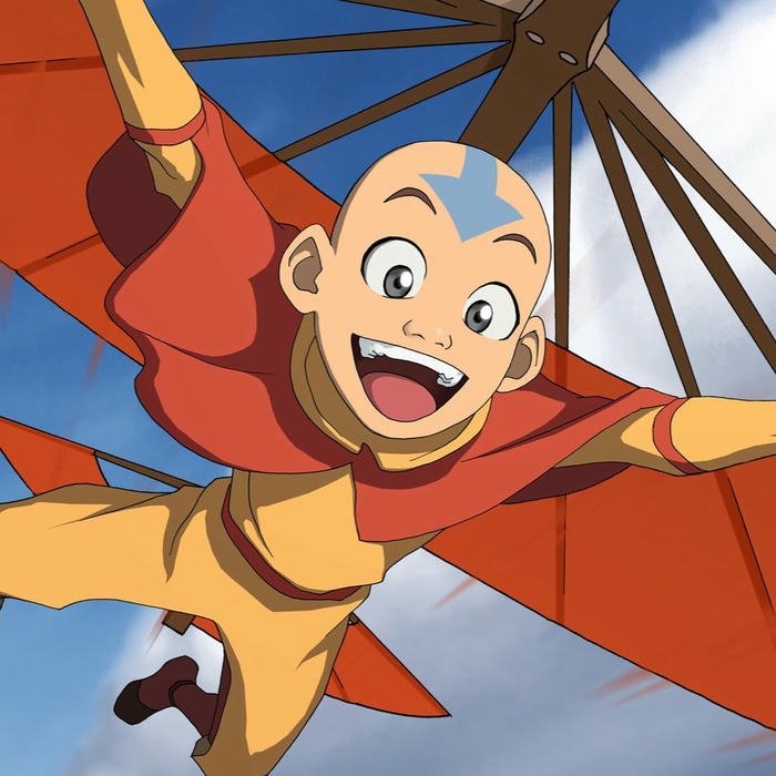 Cậu bé aang avatar đang bay lượn vui vẻ trên bầu trời