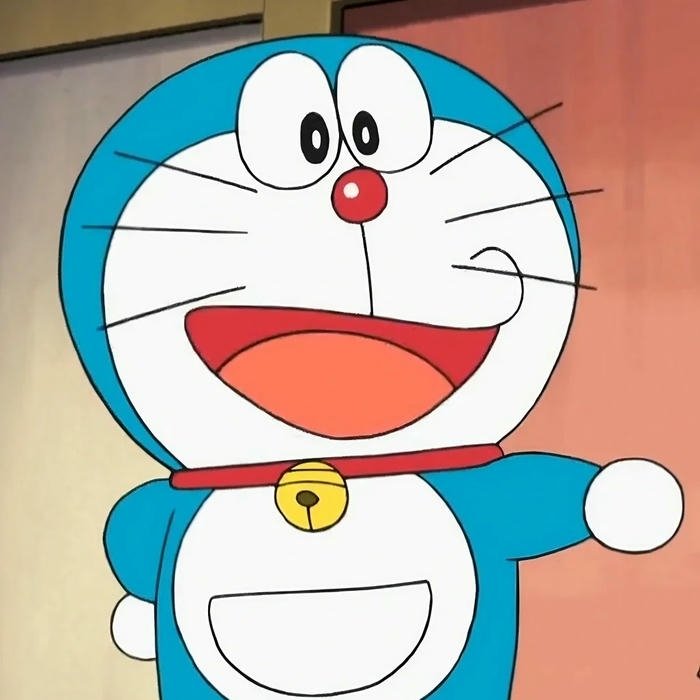 Ảnh nền Doraemon vui nhộn cười tươi rạng rỡ chào đón mọi người