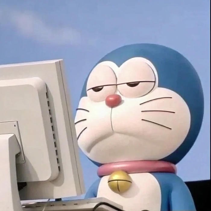 Avatar Doremon hài có biểu cảm chán nản khi ngồi máy tính